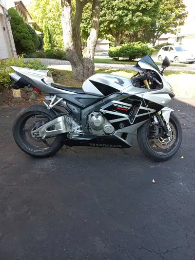 STOLEN--2005 CBR600RR, black/gray. Oxford/Wonderland, London Ont, May 29. Forged carbon front fender...