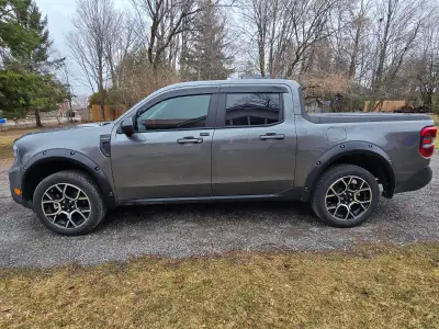 Close to Brand New tires on rims from a 2026 For Maverick Lariat! Swapped out for All Terrains at ar...