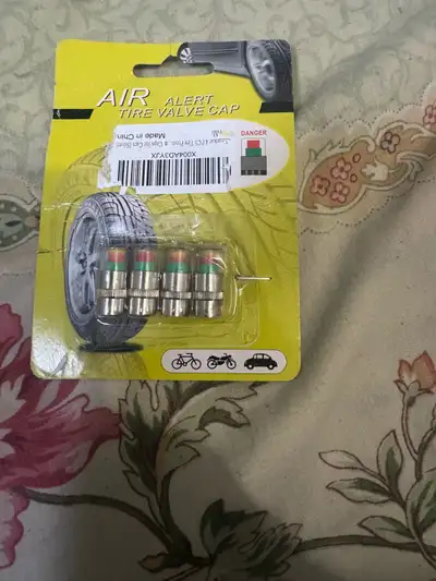 These caps are for visible tire pressure monitoring. They show green for normal pressure and red if...