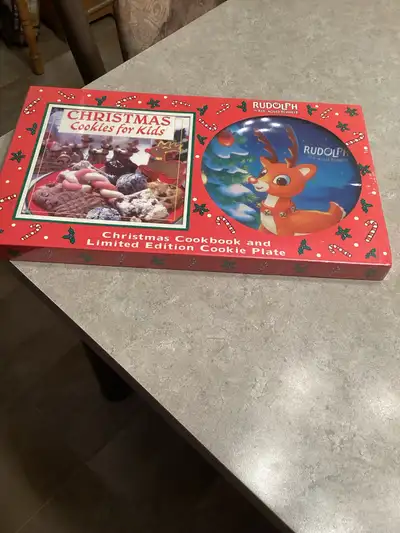 Rudolph, the red nose, reindeer Christmas cookbook, and Limited edition cookie plate New and sealed...