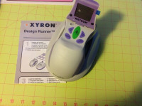 Scrapbooking tool: Xyron Design Runner kit
