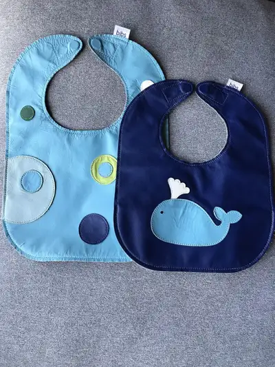 High quality Mally leather bib with magnet closure The only bib you will need! So easy to wipe clean...