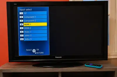 55" panasonic plasma TV with Roku and Stand., View more