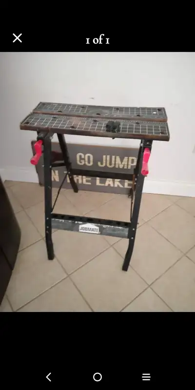 Super Handy saw horse with multiple measurements and clamps. Collapsible for easy storage