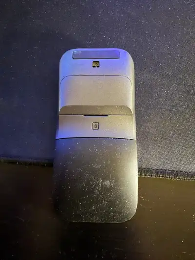 Selling a Dell Wireless Travel Mouse in grey. It's in used condition. Great for on-the-go use!