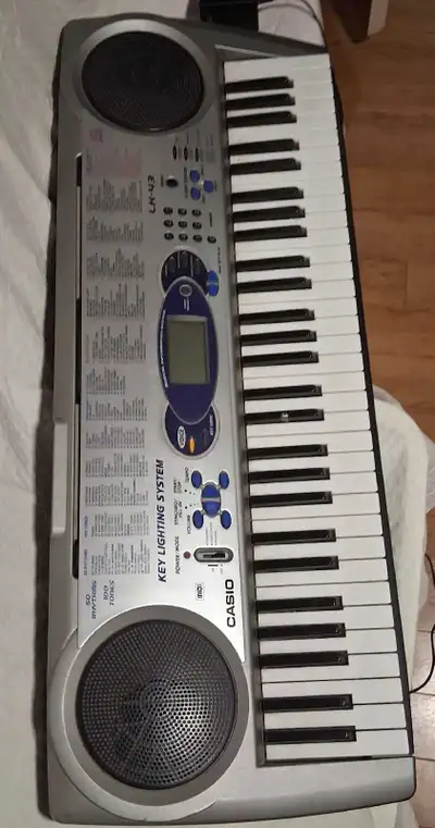 Casio LK-43 Key Lighting System Keyboard with Stand, View more