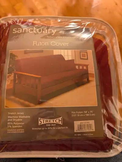 Brand new, never taken out of the package. Sells for $65 on line. Fits futon 54" x 75". Burgundy col...