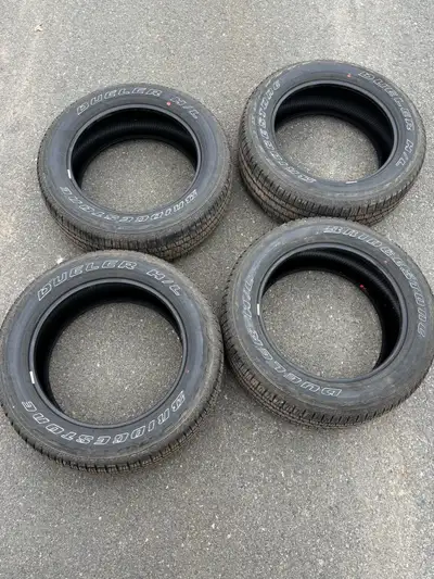 4 Bridgestone Dueler H/L tires size 275-55-20. Less than 2000 km’s on the tires. No plugs or patches...