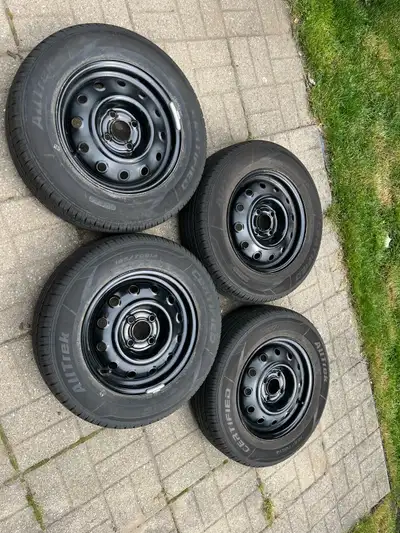 14” Summer Tires on Rims 185/70 R 14 Only used 1 year $200 obo