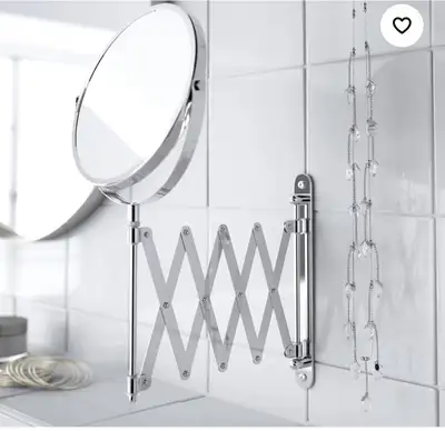 Accordion stainless steel Mirror. Check out your hair from all angles and get a close-up view when s...