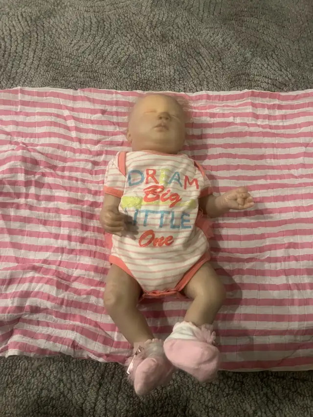 Lifelike reborn baby doll
