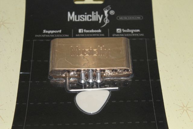 Brass Tremolo Block in Guitars in Medicine Hat