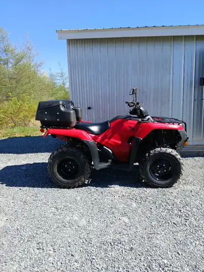 2024 Honda 420 footshift/solid rear axle.Excellent condition.Comes with mirrors and rear locking sto...