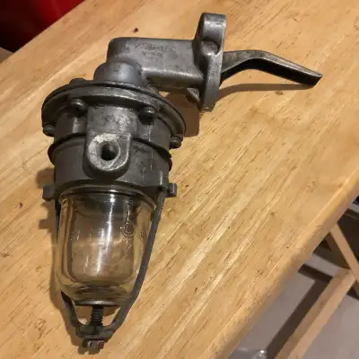 This is a Mechanical fuel pump CARbureETOR NO. 738 that will fit a 1955-60 ford V8 or international...