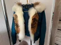 Selling a stylish denim jacket. Real Arctic fox fur!