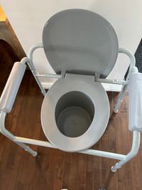 BEDSIDE COMMODE( PORTABLE TOILET)