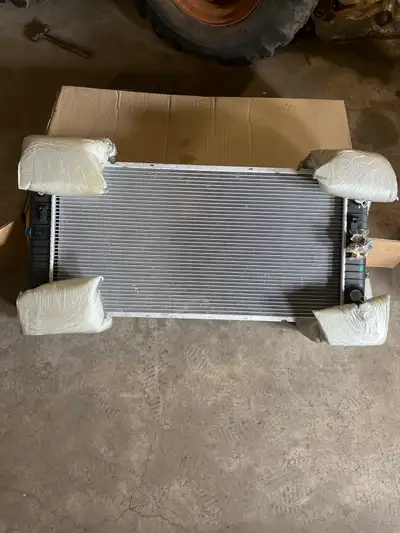 I have a brand new radiator that will fit 2005-2006 Escalade 2005, 2006 & 2009 Silverado 1500 hybrid...