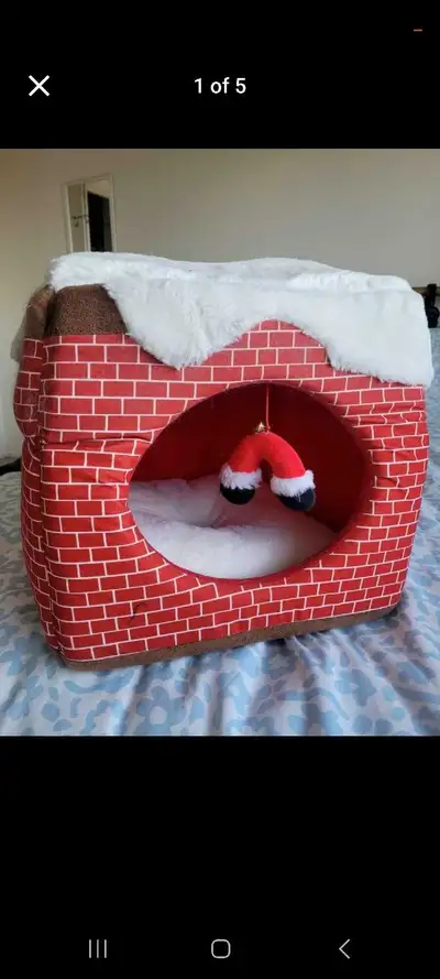 Cozy and cute cat house with a soft cushion inside. I bought this about one month ago for my cat, bu...