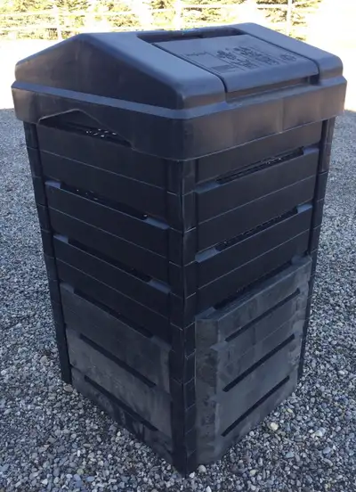 Large composting bin. With easy access top lids, front lower panel door and air ventilation holes th...