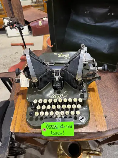 Old Oliver typewriter with original metal cover , View more