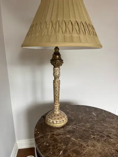 Illuminate your space with this exquisite Henredon gold candlestick lamp, a vintage piece that exude...