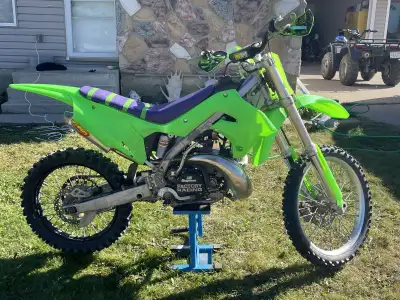 2004 Kawasaki kx 250 two smoke. Lots of upgrades done to bike. New style of plastics to make it look...