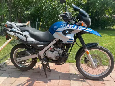 The last year of the legendary single cylinder Rotex engine. Comes with windscreen, heated grips, ab...