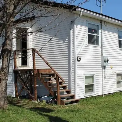 A 2nd level full floor which has three large bedrooms and large living room open concept with the ki...