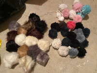 Over 40 pompoms. Furry and wooly. New.