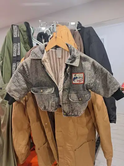 This is a vintage, used OshKosh B'gosh jacket, a charming piece of Americana for your little one! Th...