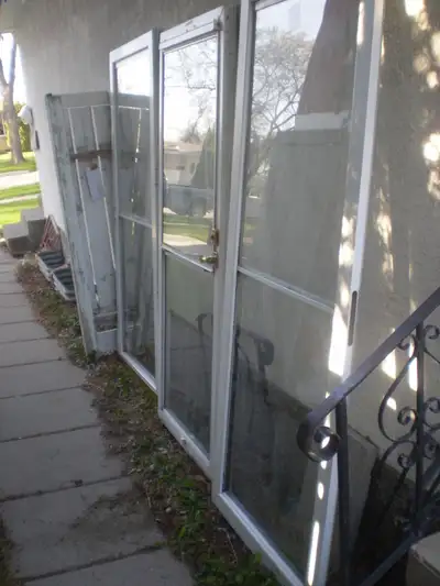 WHITE ALUMINUM STORM DOORS-HIDDEN UPPER SCREENS-NO FRAMES, View more