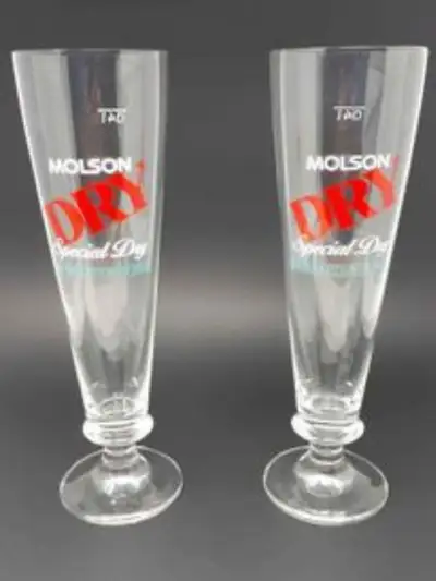 Tall Molson Dry Beer glasses. Set of 2. Measures 10.25"h x 3" w. Holds 500ml each.