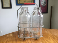 5 Glass Quart Bottles in Wire Holder $75