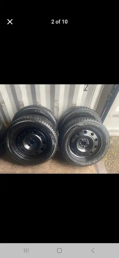 Set of 4 TOYO winter tires rims (235 55 17) pattern (5x108) TPMS 2015 FORD ESCAPE Like new.