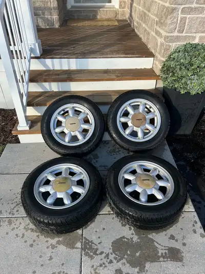 Selling a full set of 4 original Mazda Miata Daisy wheels (14x5.5, 4x100) mounted with Uniroyal Tige...