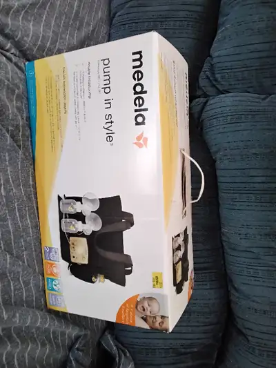 Medela double breastpump, View more