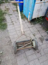 antique push lawnmower works great