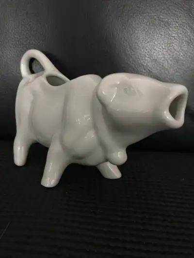 Farmhouse style decor; this standing moo cow jug creamer has an open mouth for pouring the milk with...