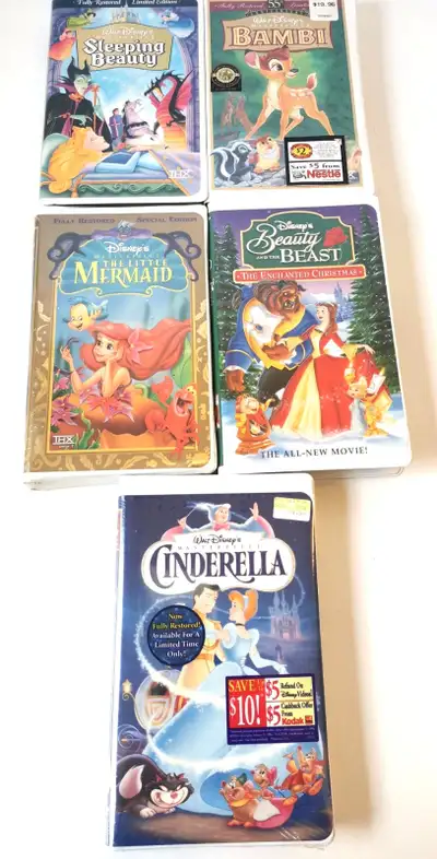 Immerse yourself in the magical world of Disney with this classic VHS collection featuring beloved t...
