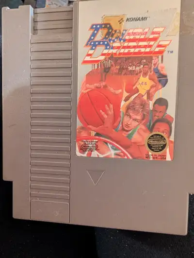 Relive the classic basketball action with this original Konami Double Dribble game cartridge for the...