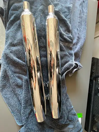 Harley slip on exhaust never used. Located in Gananoque for pickup.