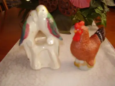 Selling these two ornaments together. Hen is 4 1/2" high and parrots are 6" high, Parrot ornament ha...