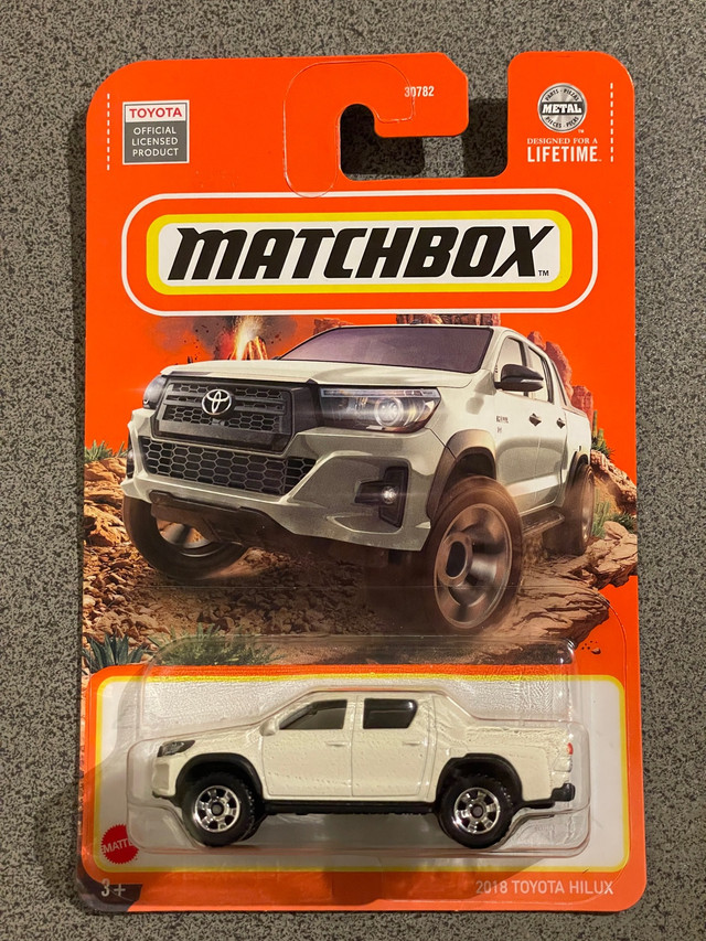 Matchbox Hot wheels Toyota Hilux pick up truck white in Toys & Games in Markham / York Region