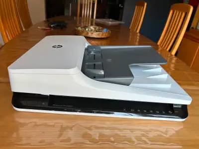 Scanner used in a home environment. Provides very good document scans and several features. Works ju...