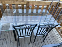 Glass kitchen table with two chairs 