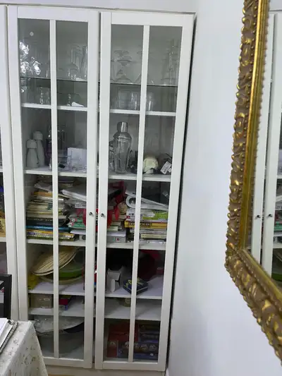 $220 for two IKEA Billy Bookcase with Glass Doors, View more