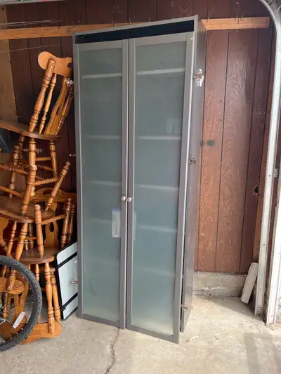 31.5” W 11” D 80” H Works well, can be with our without glass doors. Some wear and tear, and bottom...