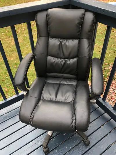 Leather high back office chair in very good condition. All adjustment are functional. $25