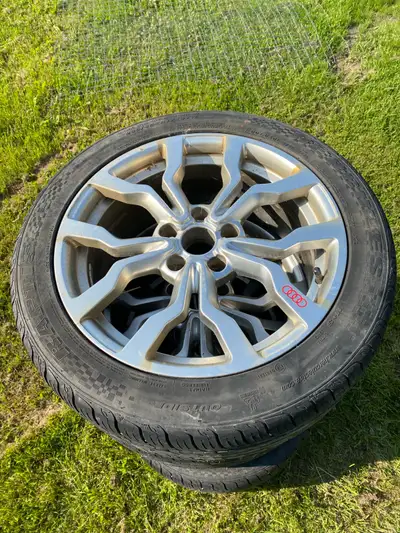 4 Aluminum 5 bolt Audi rims and tires from an A4 Quattro. Used- ok condition will clean up nice need...