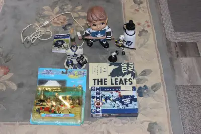 If ad is up item is available . Please call if interested. Toronto Maple Leafs Collectibles lot. 1)...